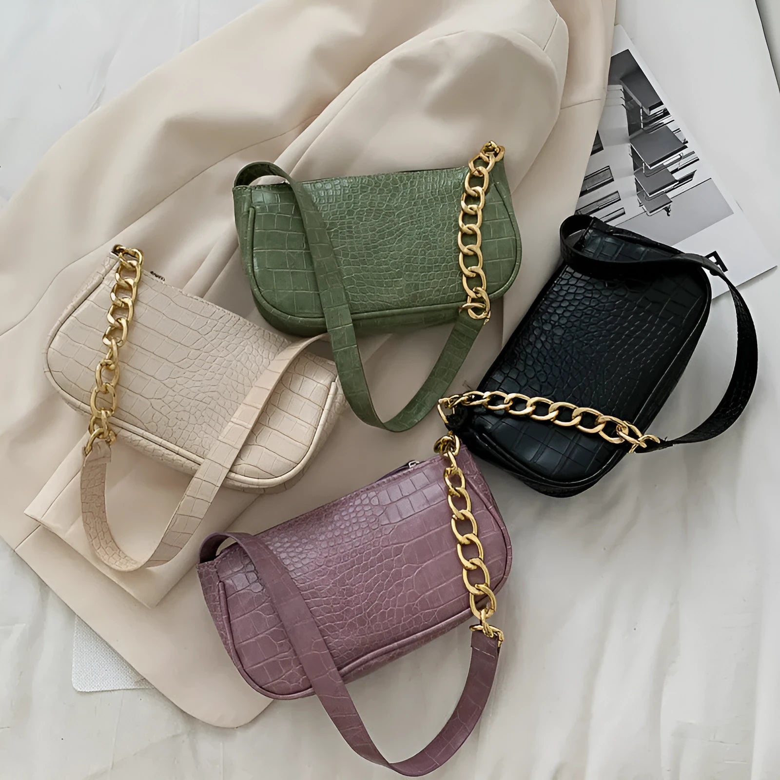 Retro women's shoulder baguette bag in PU leather with car suture detail and zipper closure