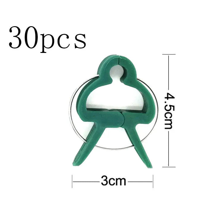 Green plastic and zinc plant support clips for climbing vegetables, showing large and small sizes.