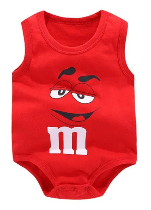 Newborn baby wearing a white sleeveless cotton vest with a colourful star print design.