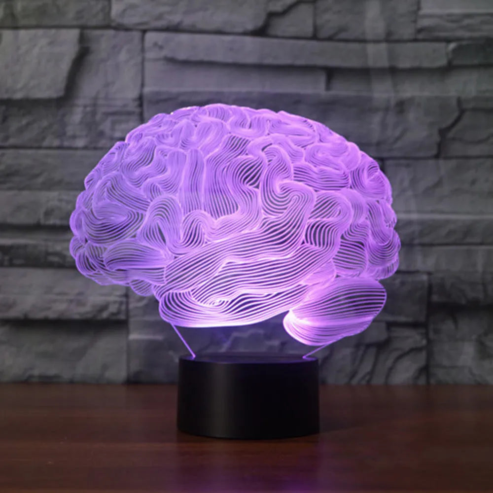 3D acrylic brain-shaped LED desk lamp with colourful lighting on a black ABS base.