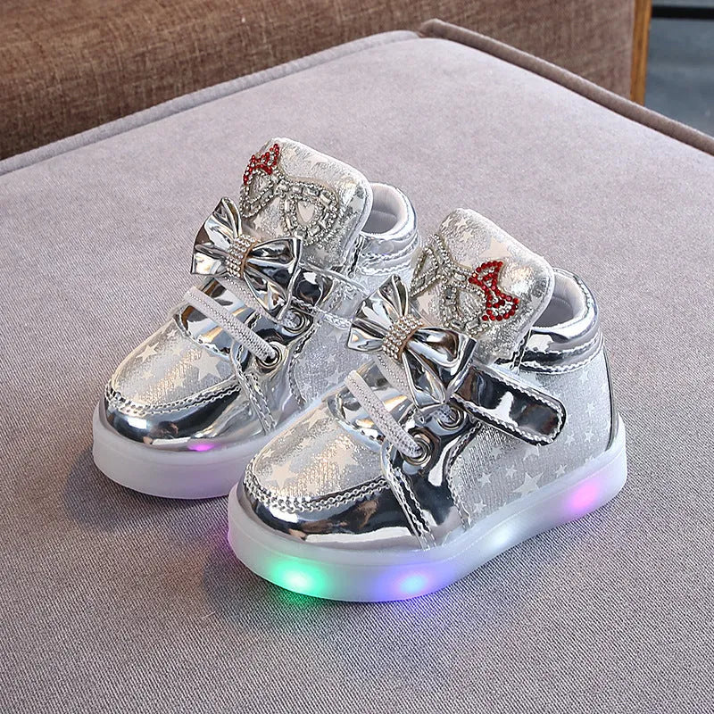 LED children's trainers with magic button switch showing colour changing lights and flashing heel illumination