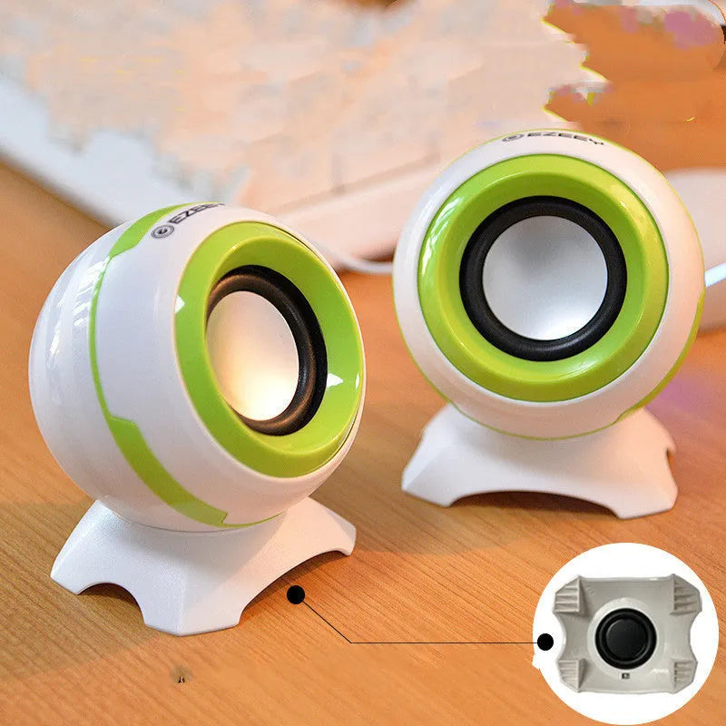 Pair of compact desktop speakers with USB cable and 3.5mm audio connection