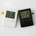 Magnetic kitchen timer in black and white colour options showing front display and magnetic back