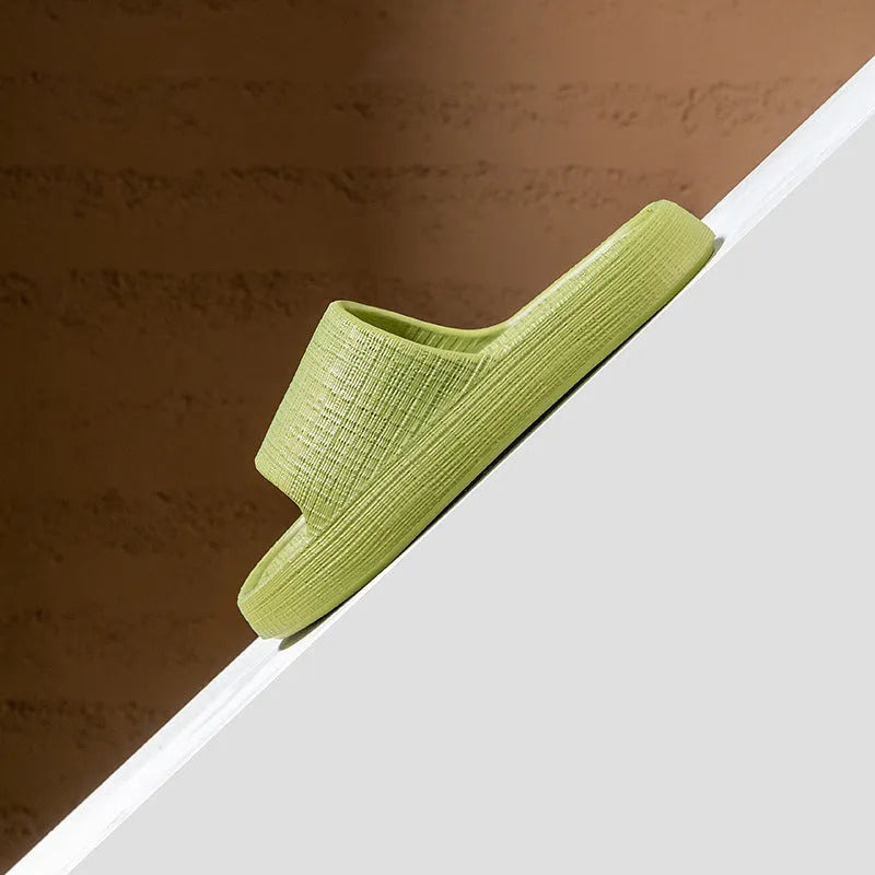 Unisex adult EVA flip flop slippers with toe ring and non-slip sole in multiple colours.