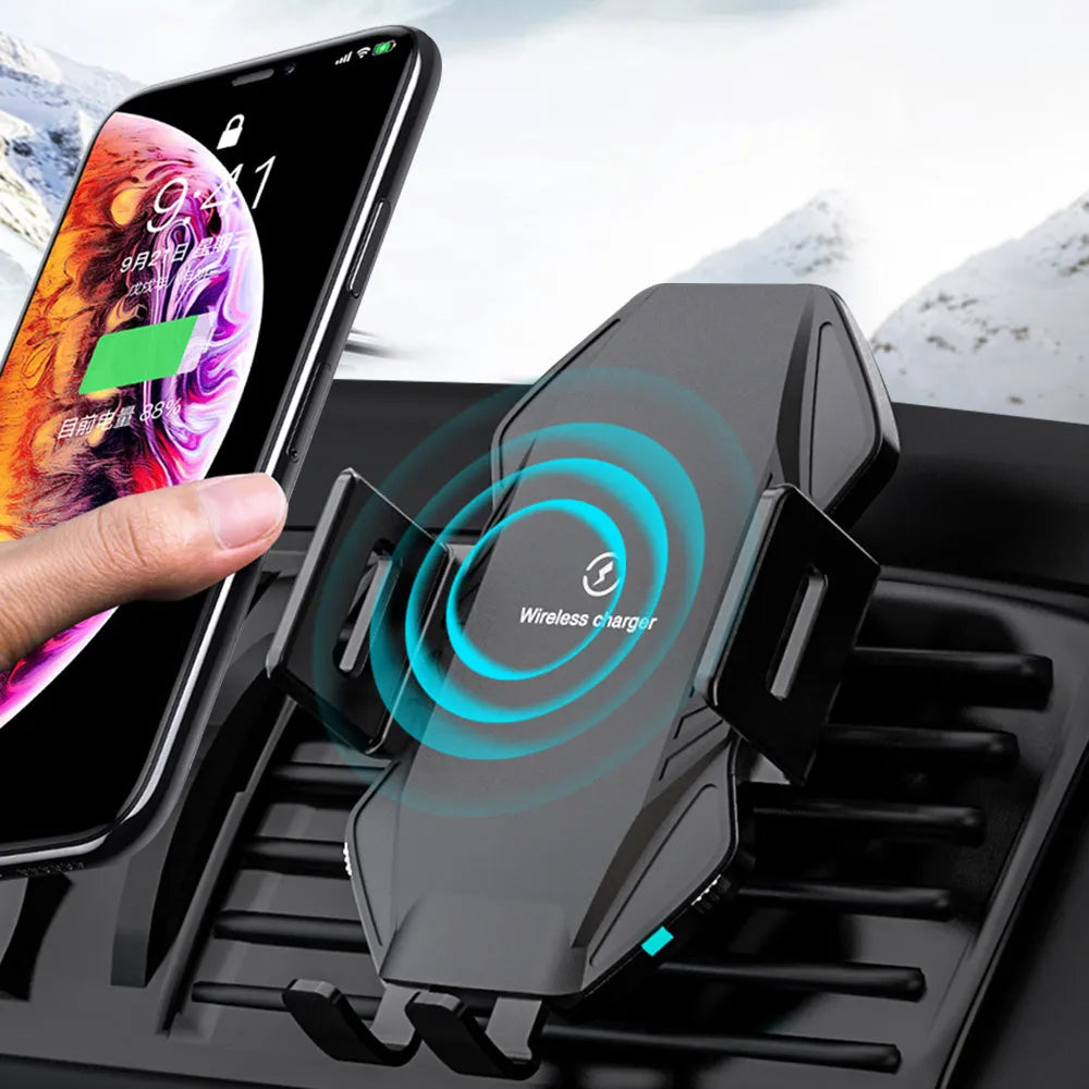 Black wireless car charger with auto-sensing clamp mounted on a car dashboard.