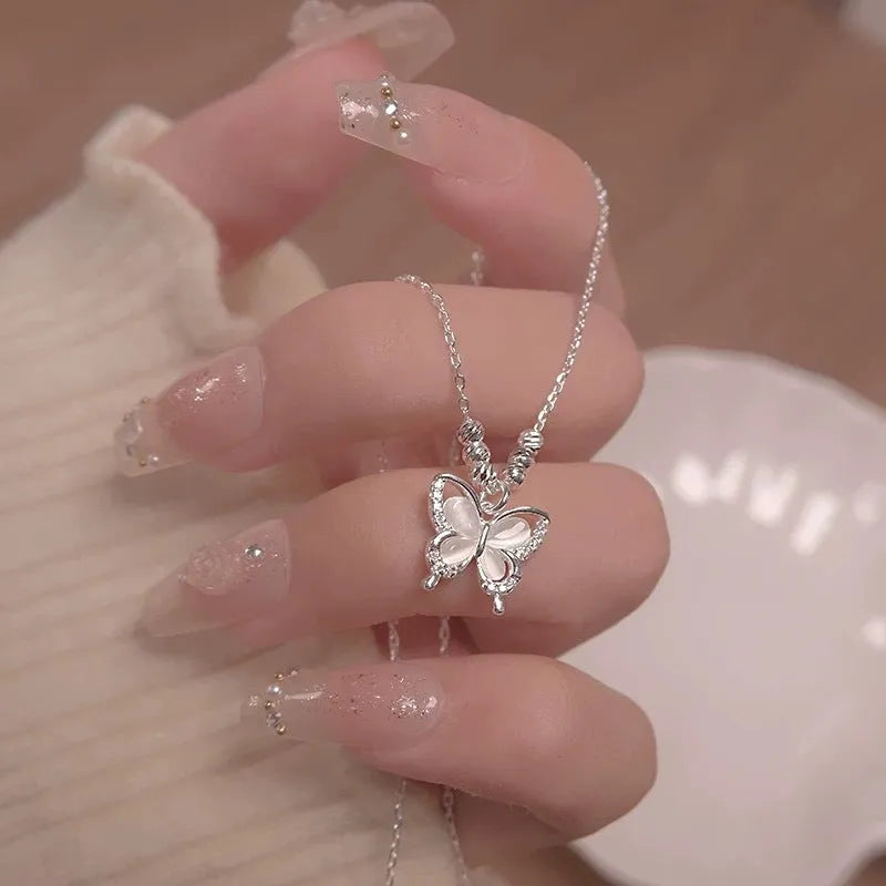 Women's square line opal butterfly necklace in 925 silver with a cross chain.