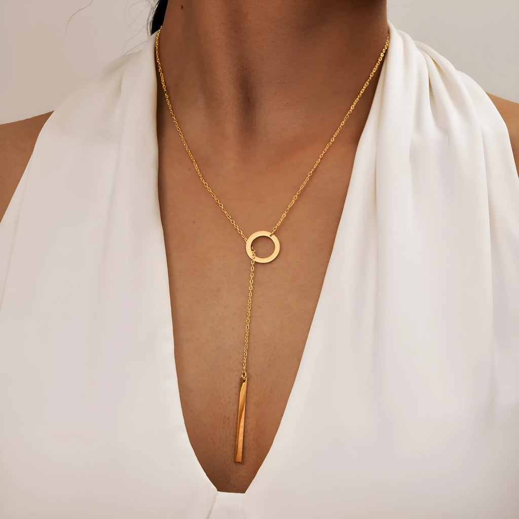Gold electroplated stainless steel cross and ring geometric pendant necklace on O-link chain