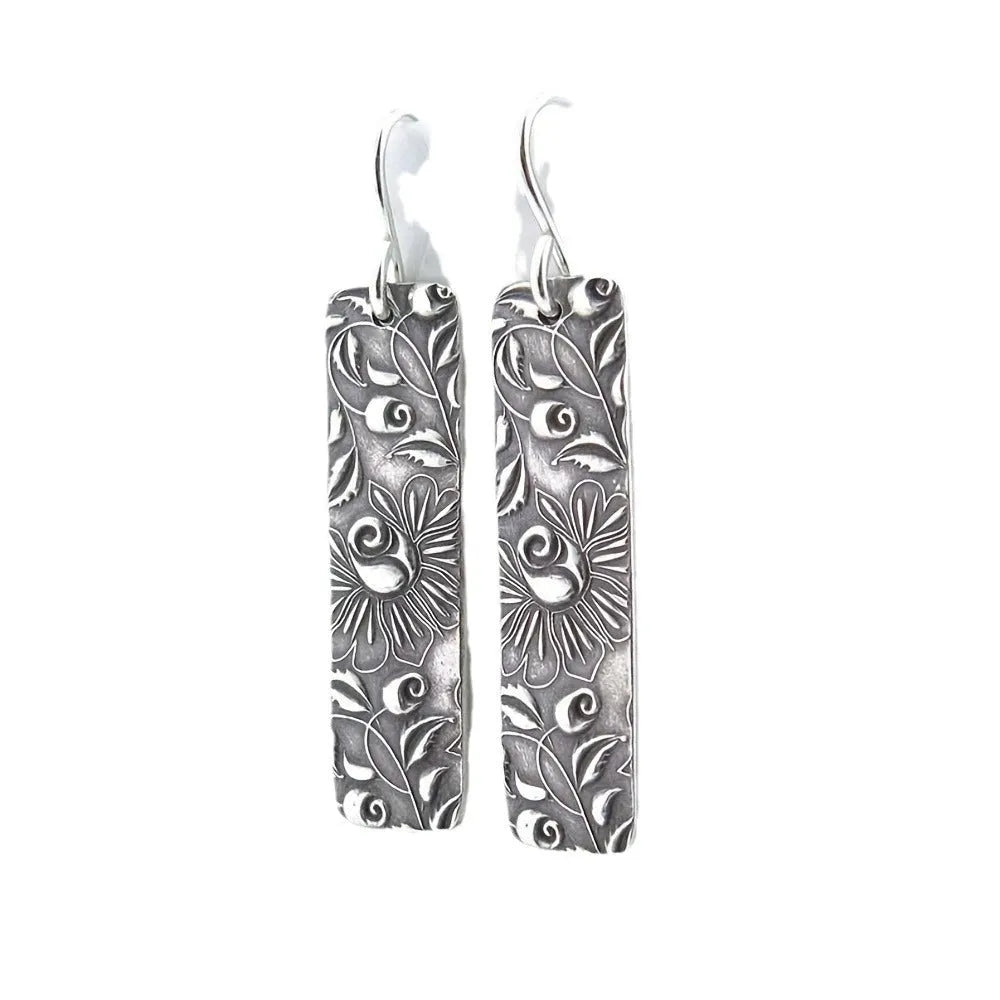 Silver geometric long earrings with carved vine design in retro style