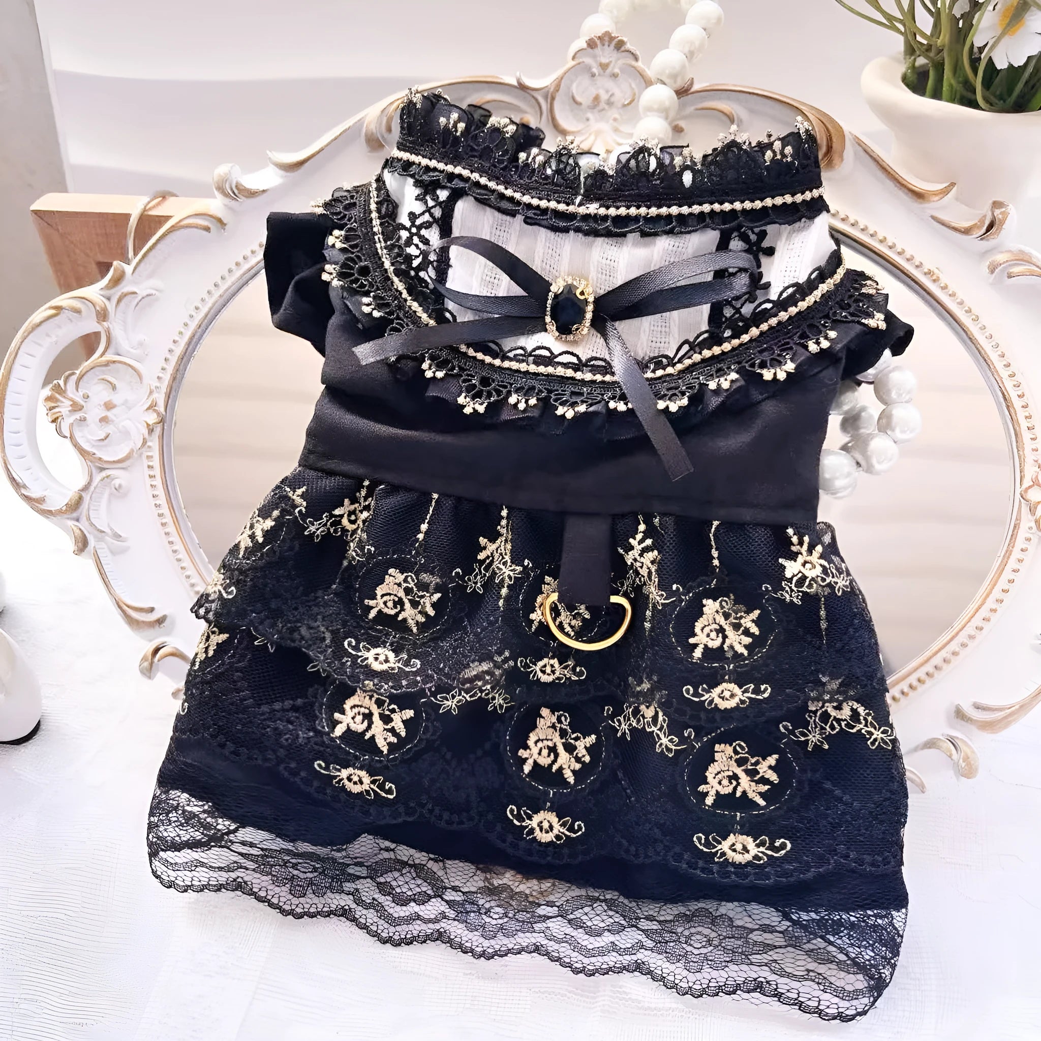 Golden Gothic princess-style skirt pet clothing for a small dog or cat on a mannequin.