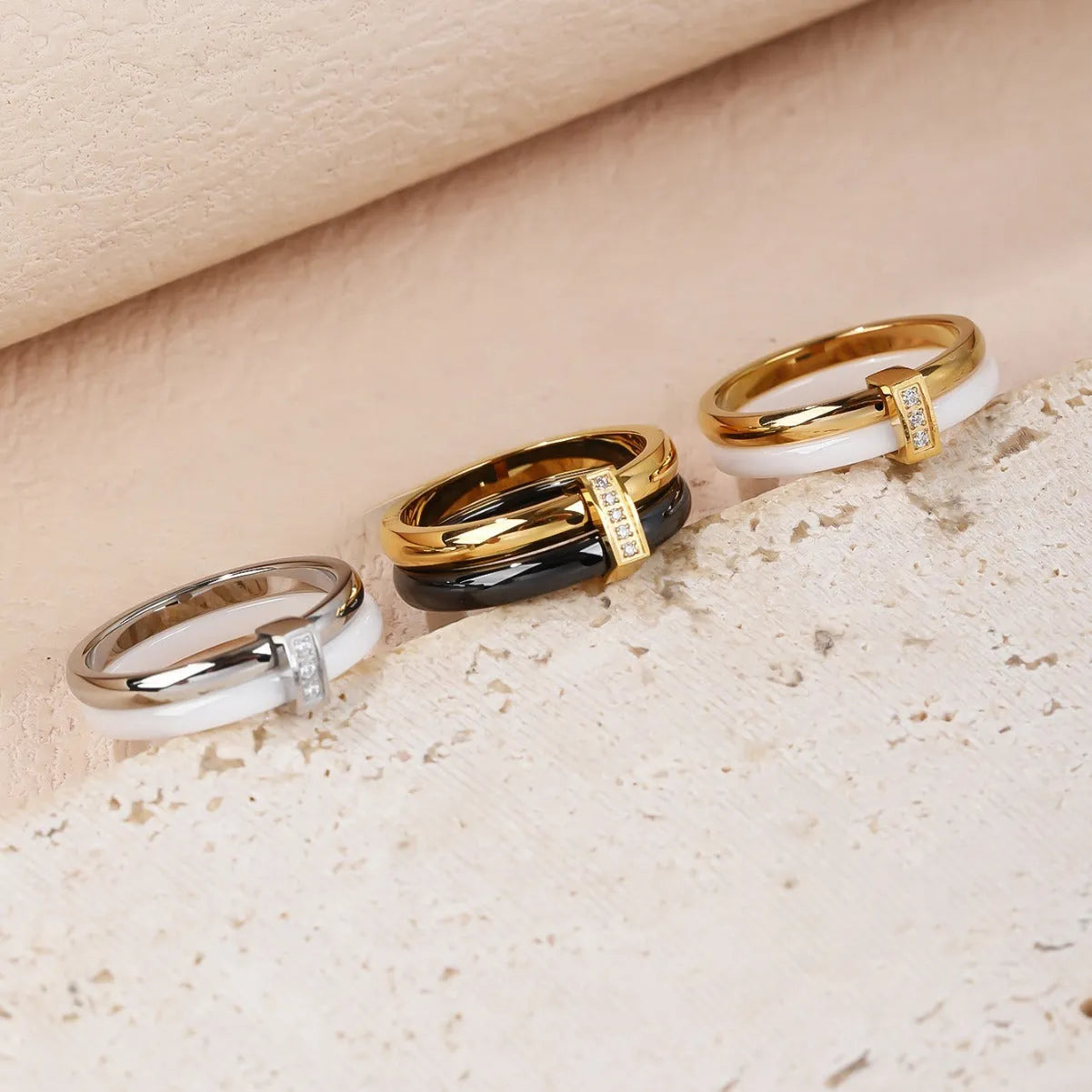Glossy titanium steel women's ring with heart shape formed by a double band and zirconium inlay.