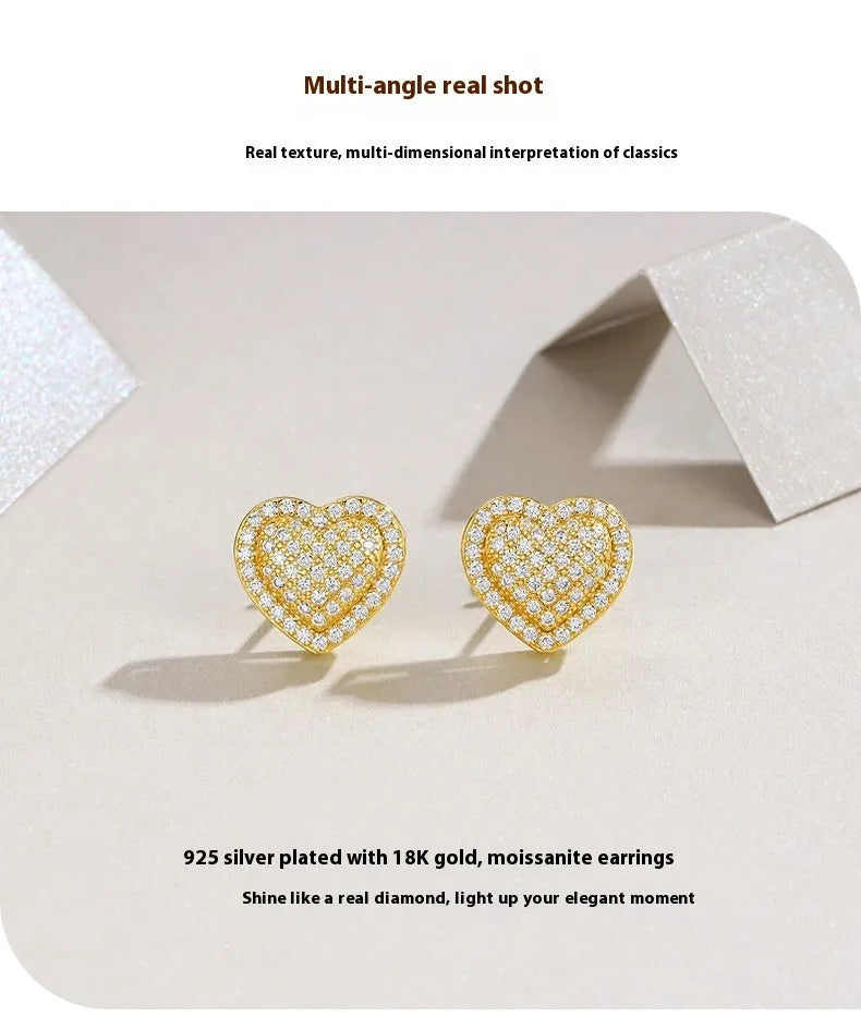 S925 silver gold moissanite heart-shaped stud earrings on white background