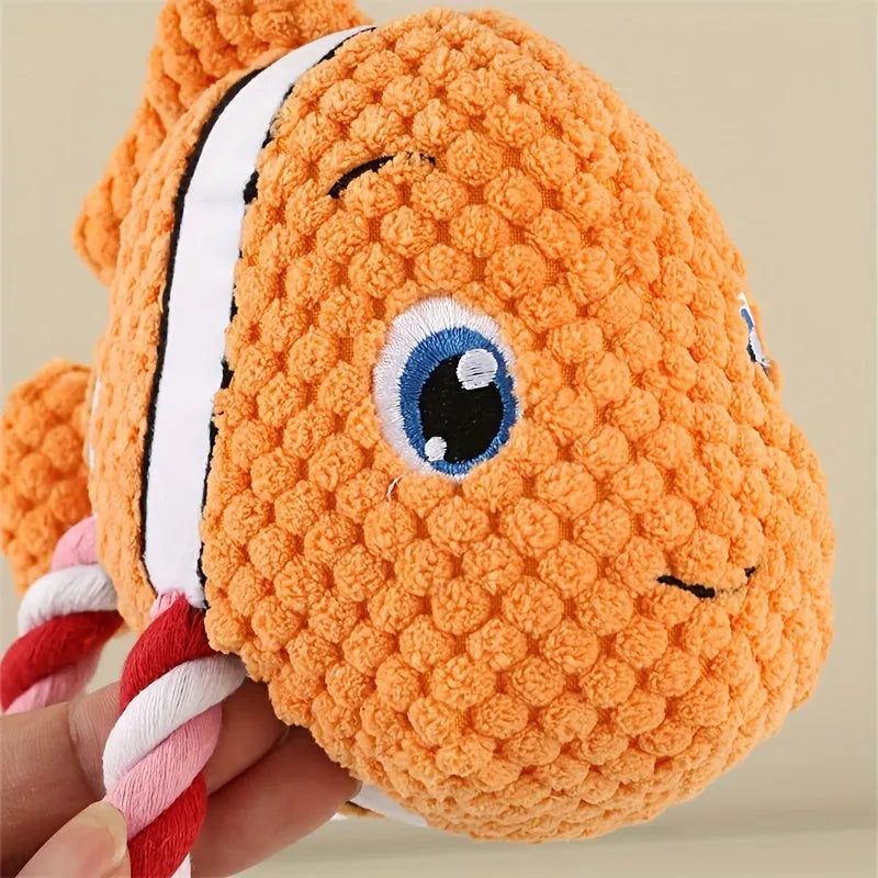 Turtle shaped plush dog chew toy with knotted rope interior in grey green and orange colour options