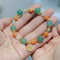 Jinsi Jade Duobao Pumpkin Bracelet with Prehnite stones for a 14-16.5cm wrist.