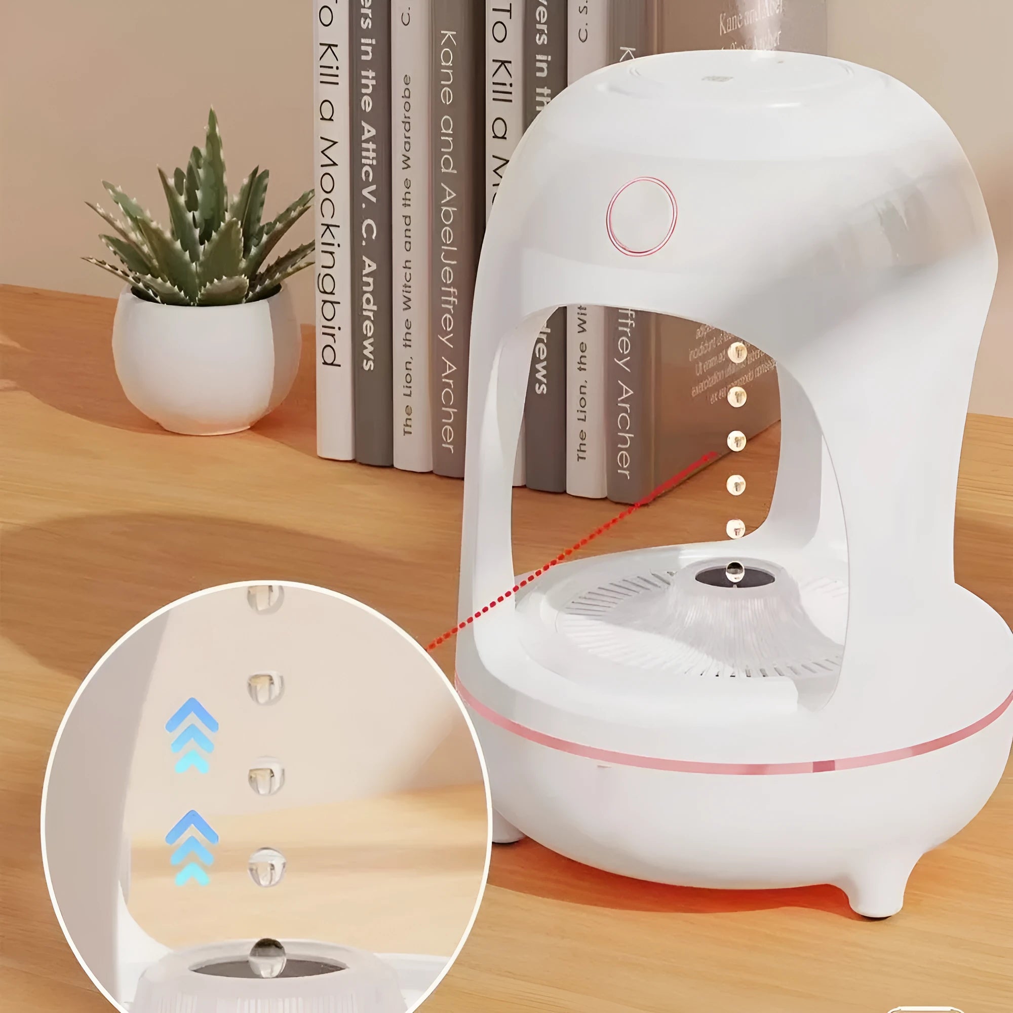 Rose gold and white ultrasonic humidifier with levitating water drop design and LED night light