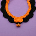 Hand-crocheted wool Halloween pet collar with pumpkin design in adjustable sizes for cats and dogs