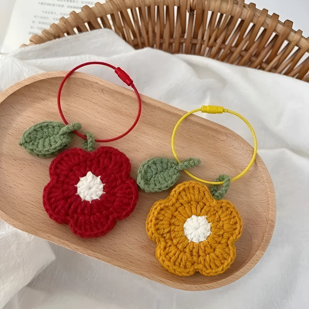 Hand crochet flower pendant made from plush wool in red or yellow colour