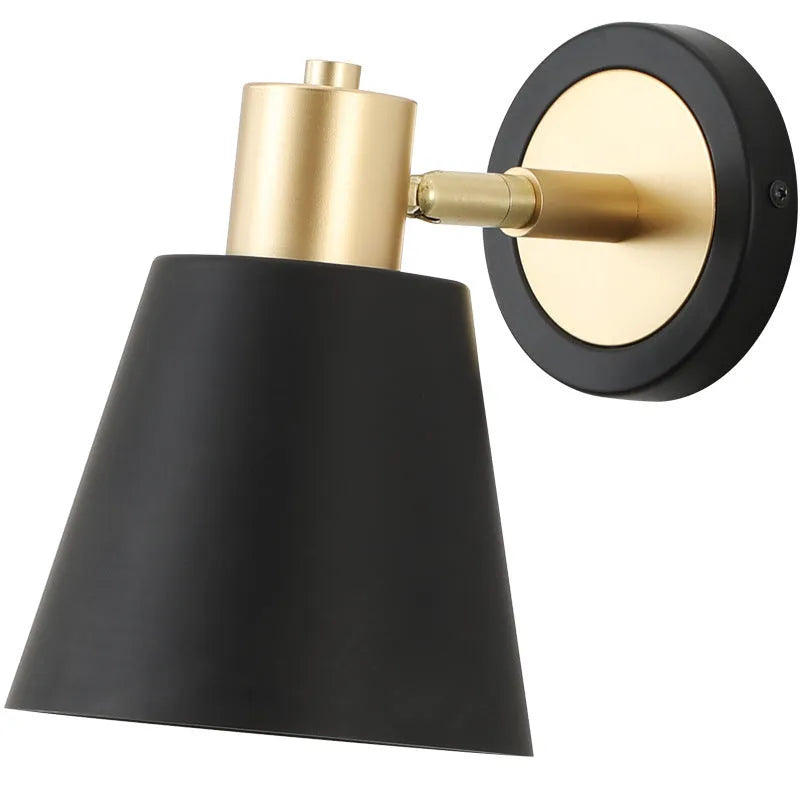 Nordic style iron wall lamp with a metallic shade for bedside or living room.