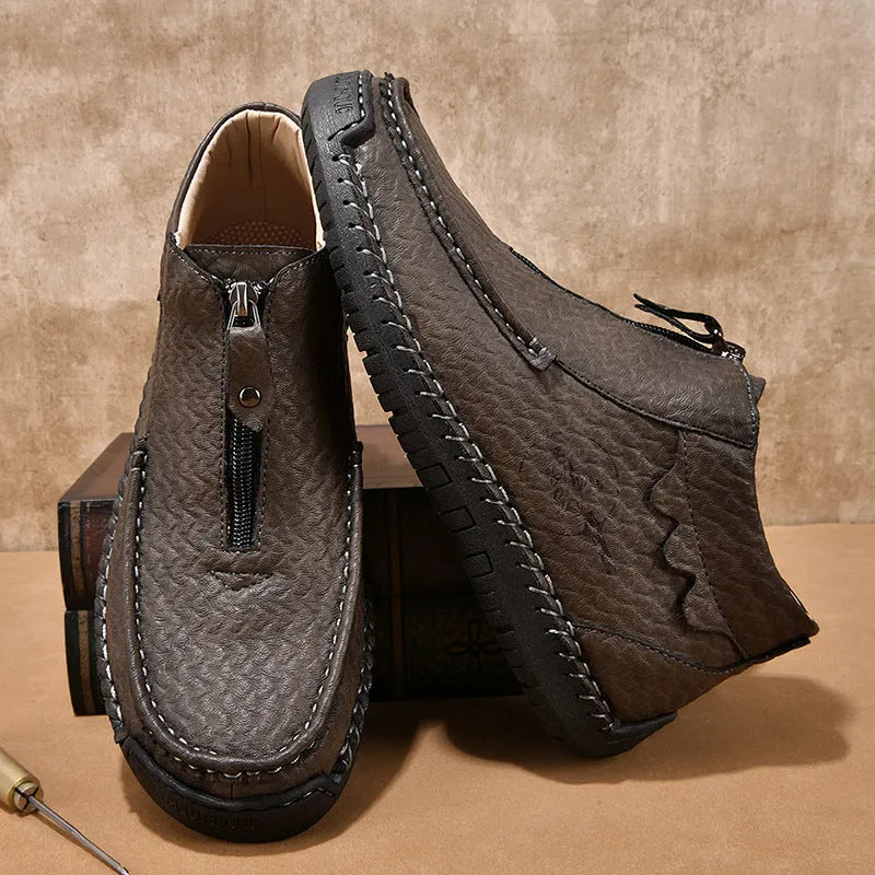 Men's black slip-on loafers with round toe and low flat rubber sole