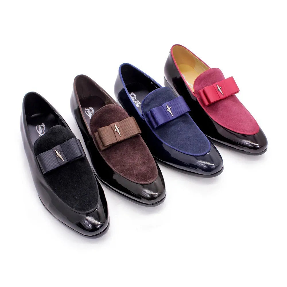 Men's black low-top leather brogue shoes with a patent leather finish and tassel detail on a rubber sole.