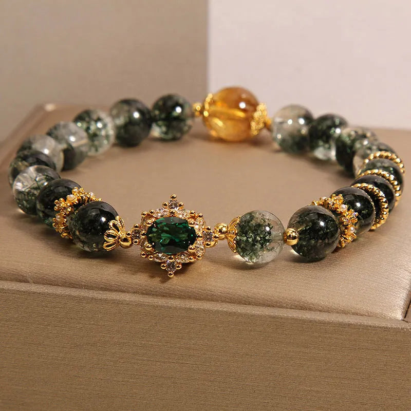 Gold rutilated quartz women's bracelet with green phantom quartz, ruby quartz beads and crystal accents