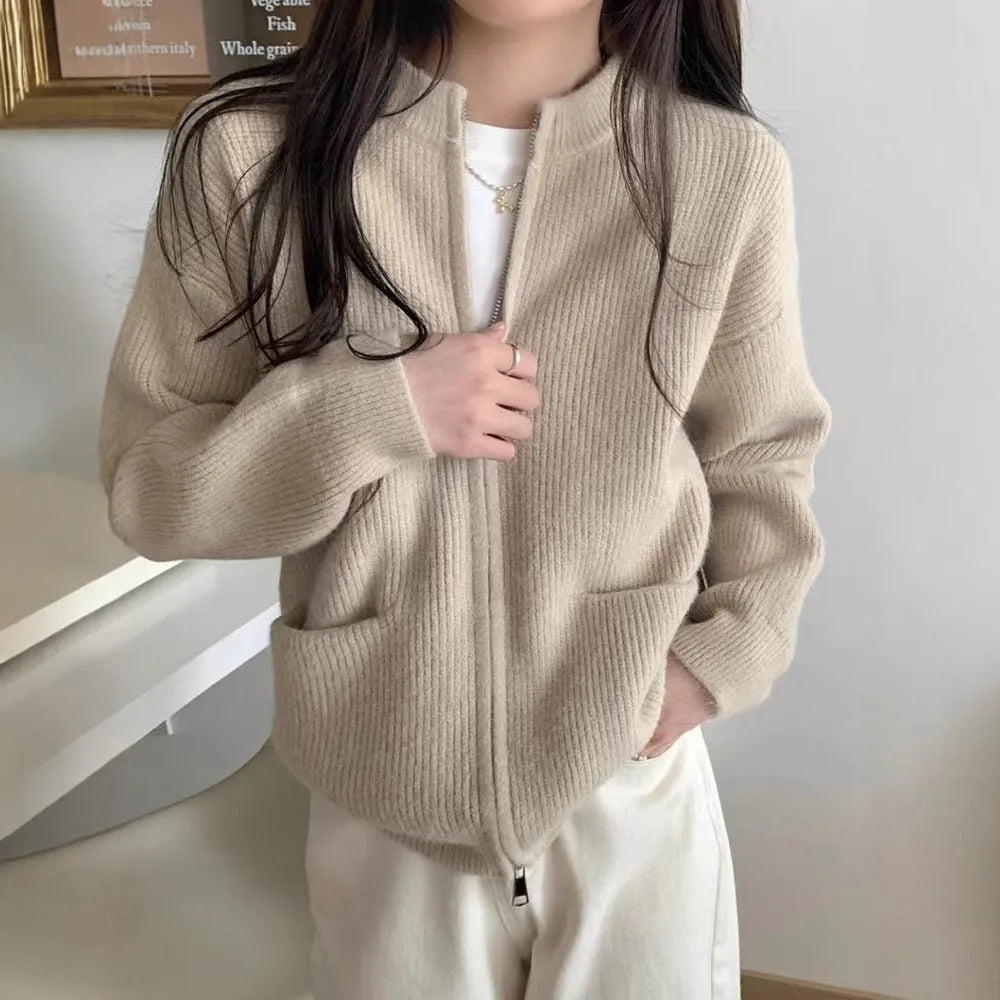 Beige viscose fibre soft sweater coat with long sleeves and open cardigan front.