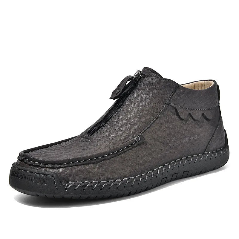 Men's black slip-on loafers with round toe and low flat rubber sole