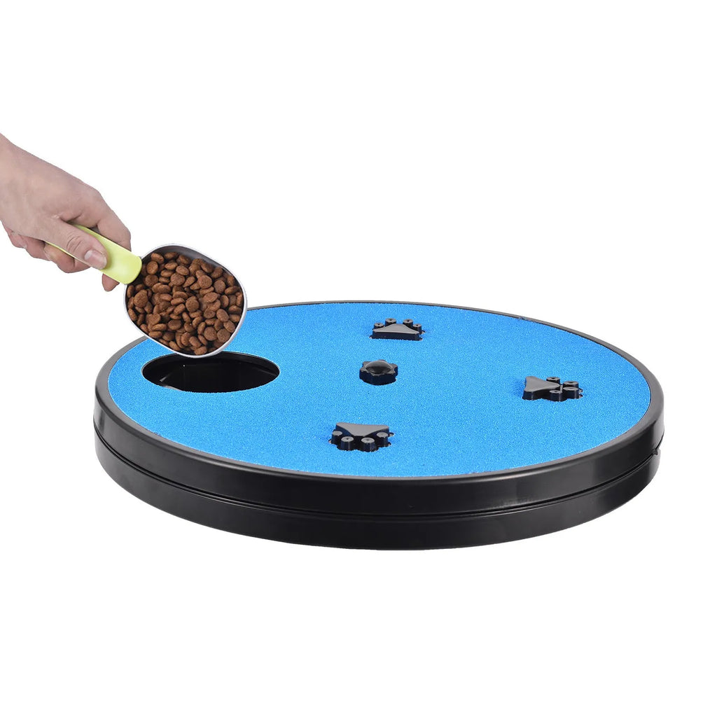 Square dog scratch pad with rotatable top cover showing food compartments and textured scratching surface