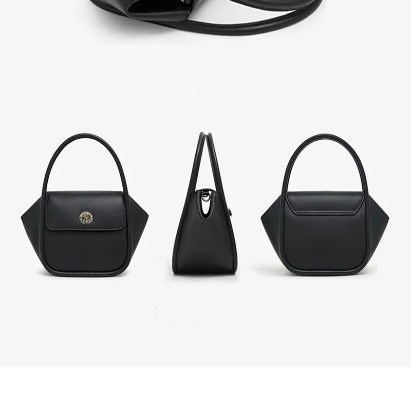 A wing-shaped cow leather women's tote bag with a cross-body strap and latch closure in a choice of colours.