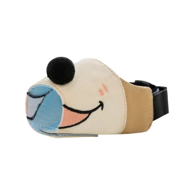 Canvas dog muzzle mouth cover in Ollie Brown Bear colour on a size chart for dogs.