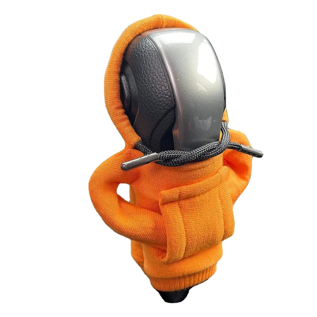 Blue cloth car gear shift knob hoodie cover shown on a gear lever.