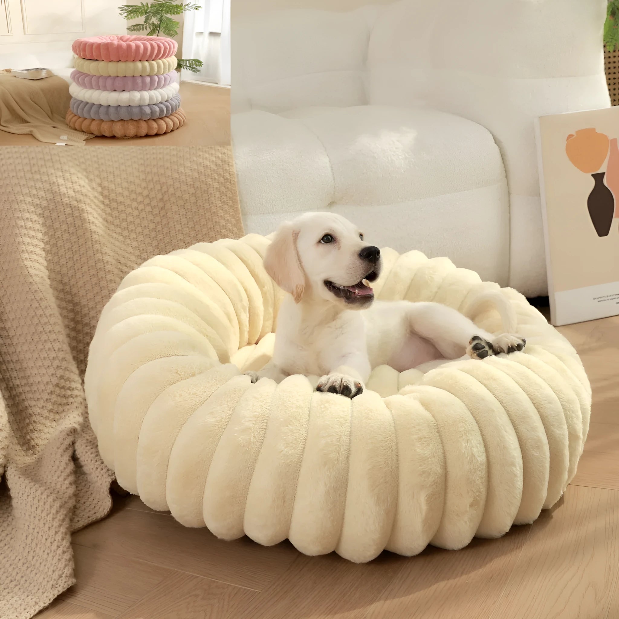 A round, plush beige pet nest bed for cats or dogs on a wooden floor.