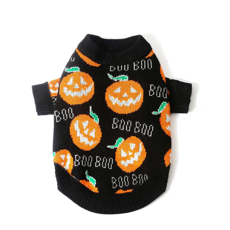 Black Halloween dog sweater with orange pumpkin pattern, showing Velcro strap closure at back