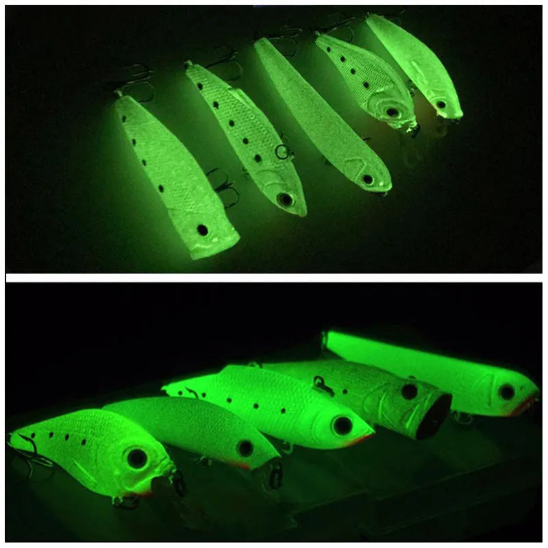 Set of five fluorescent green and orange hard plastic fishing lures with 3D details on a blue background.