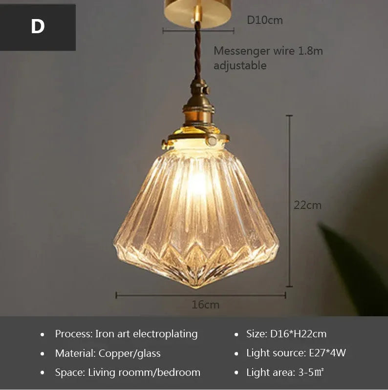 Brass and glass ball chandelier with spherical shade and metallic body