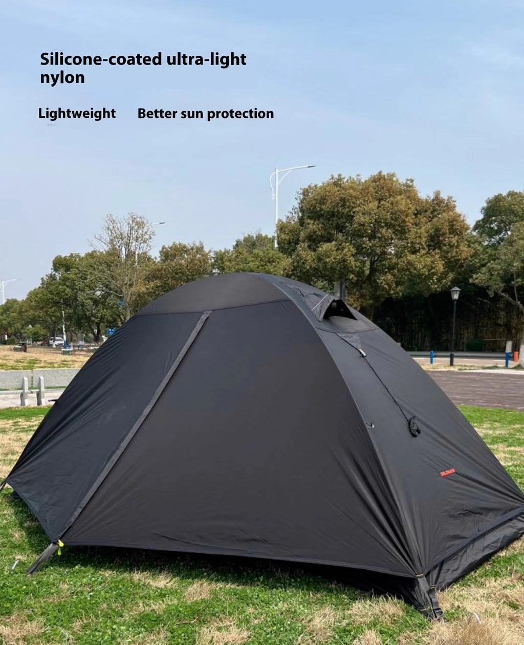 Single person lightweight tent in red colour with aluminium poles, shown expanded.