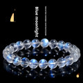 Natural cream body blue moonlight crystal bracelet on a white background showing grinding finish.