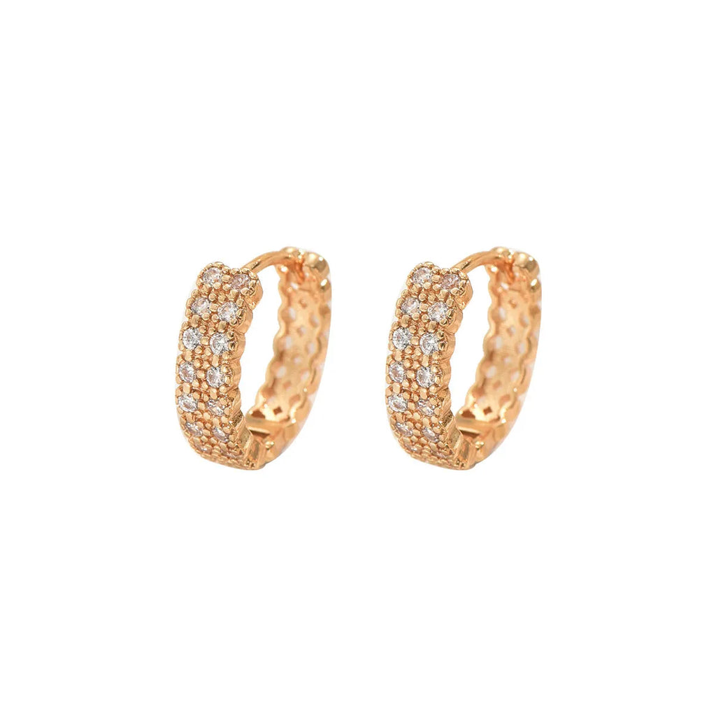 Geometric pattern copper ear studs in colour DE20288 showing round, dot, and ring design elements.