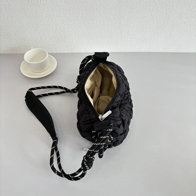 Women's lightweight nylon messenger bag in pillow shape with diamond pattern