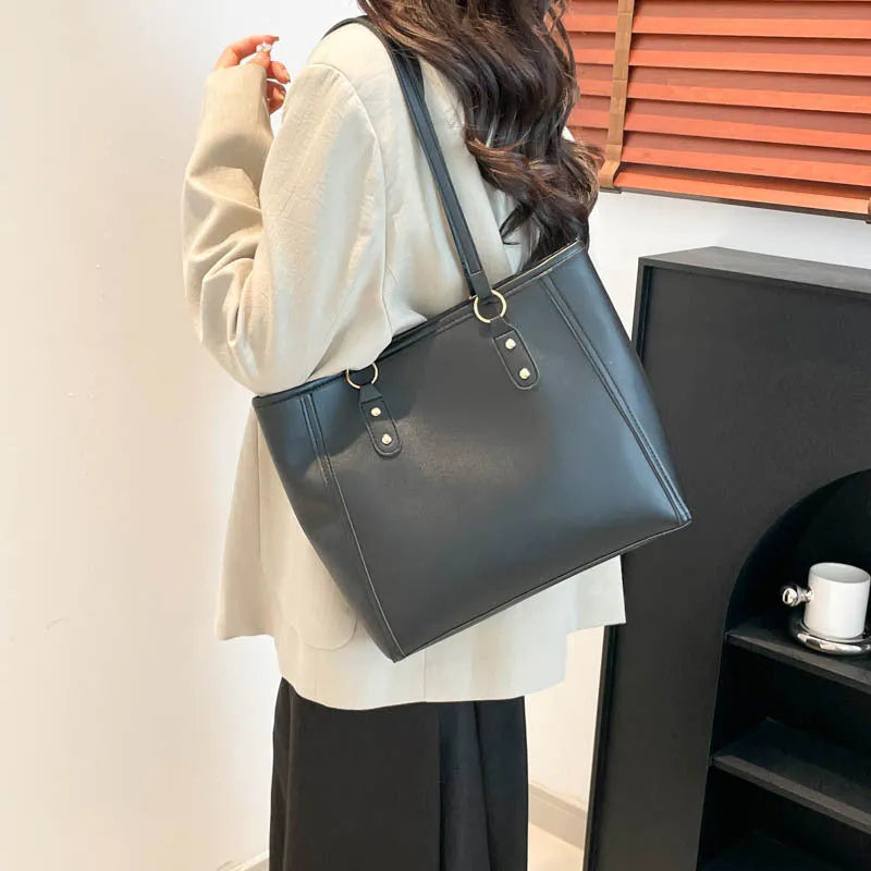 PU leather contrast colour tote bag with horizontal square shape and outer slit pocket.