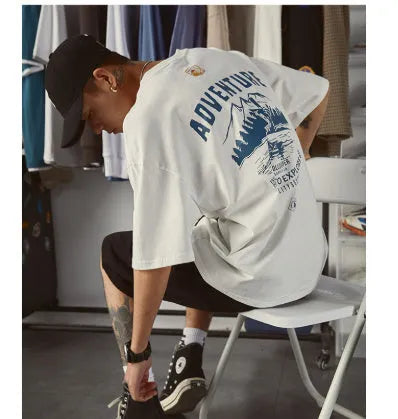 Men's plus size short-sleeved t-shirt in loose fit design available in black, dark grey and white colours