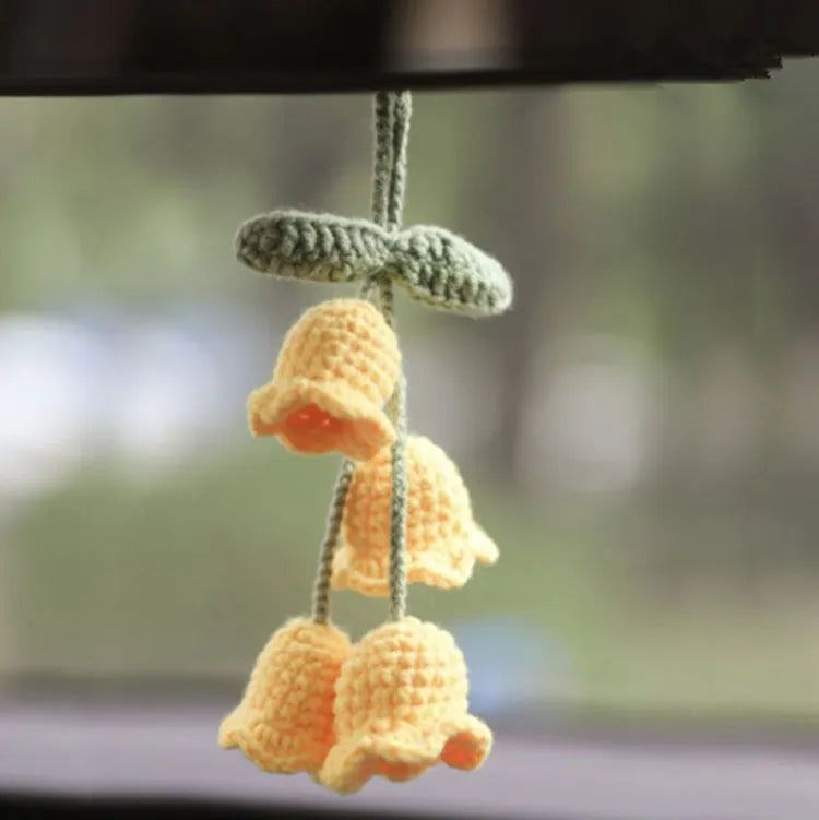 Green and white knitted wool car plant decoration with 8cm base and 25cm hanging rope