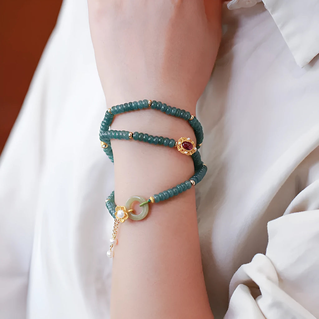 Blue water jade abacus bead bracelet with tourmaline rings and pearls on elastic string