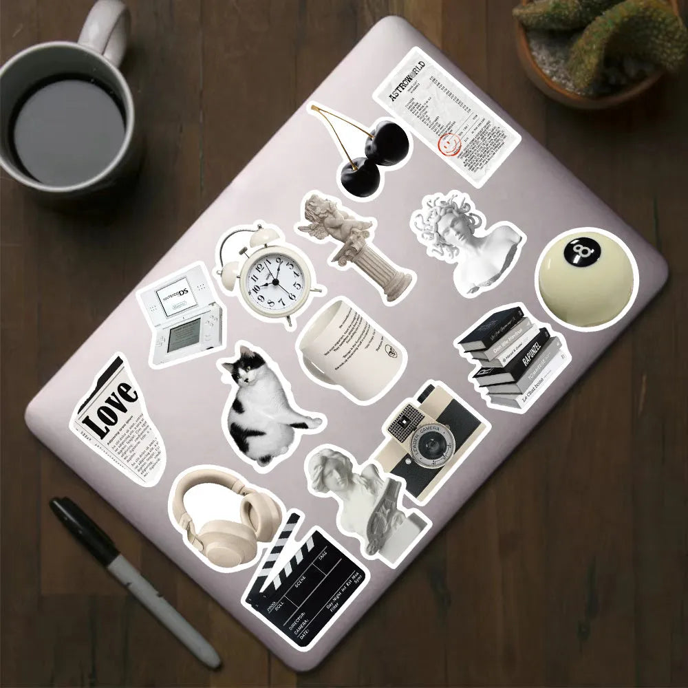 Pack of 61 black and white simple style PVC waterproof stickers for laptops and phones.