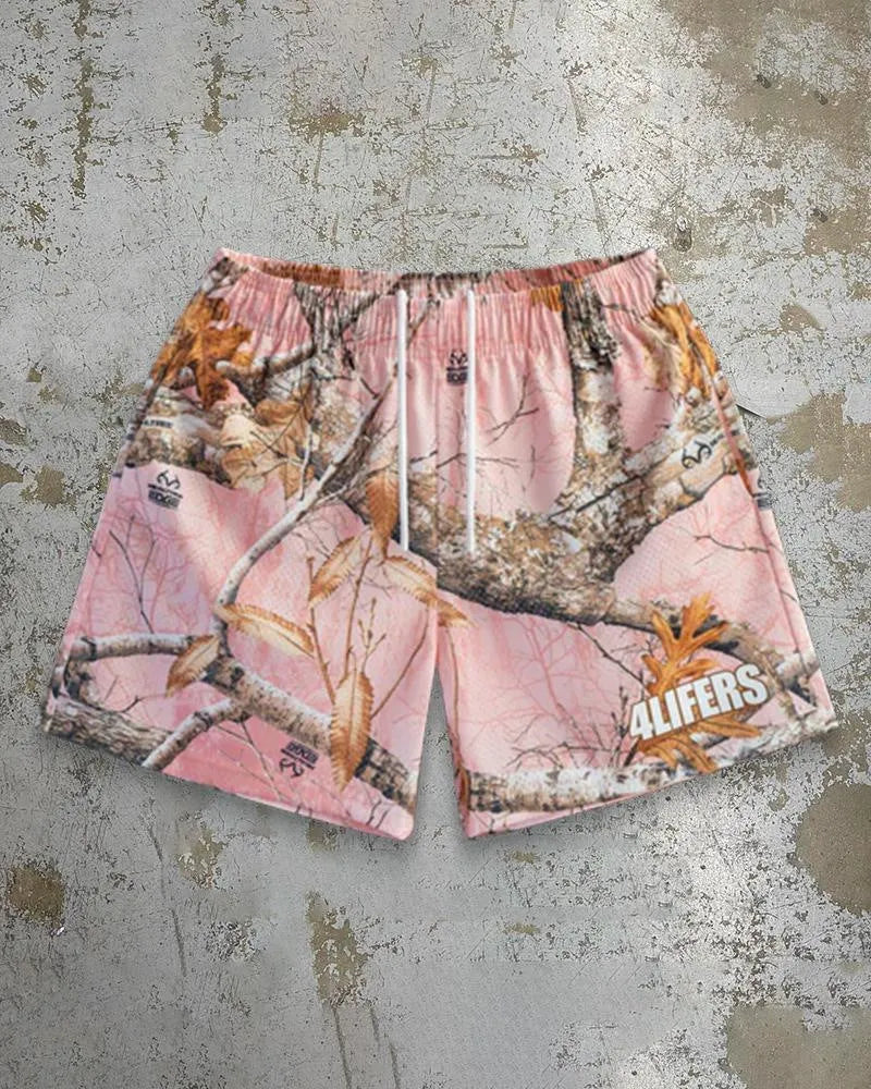 Mens loose fit quick-drying beach shorts with digital print design and elastic waistband in a light colour.