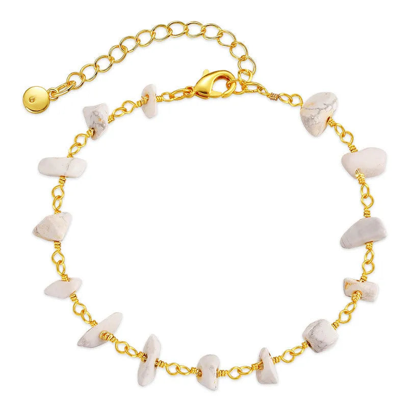 18K copper geometric women's bracelet with irregular turquoise stones and crystals in multiple colours.