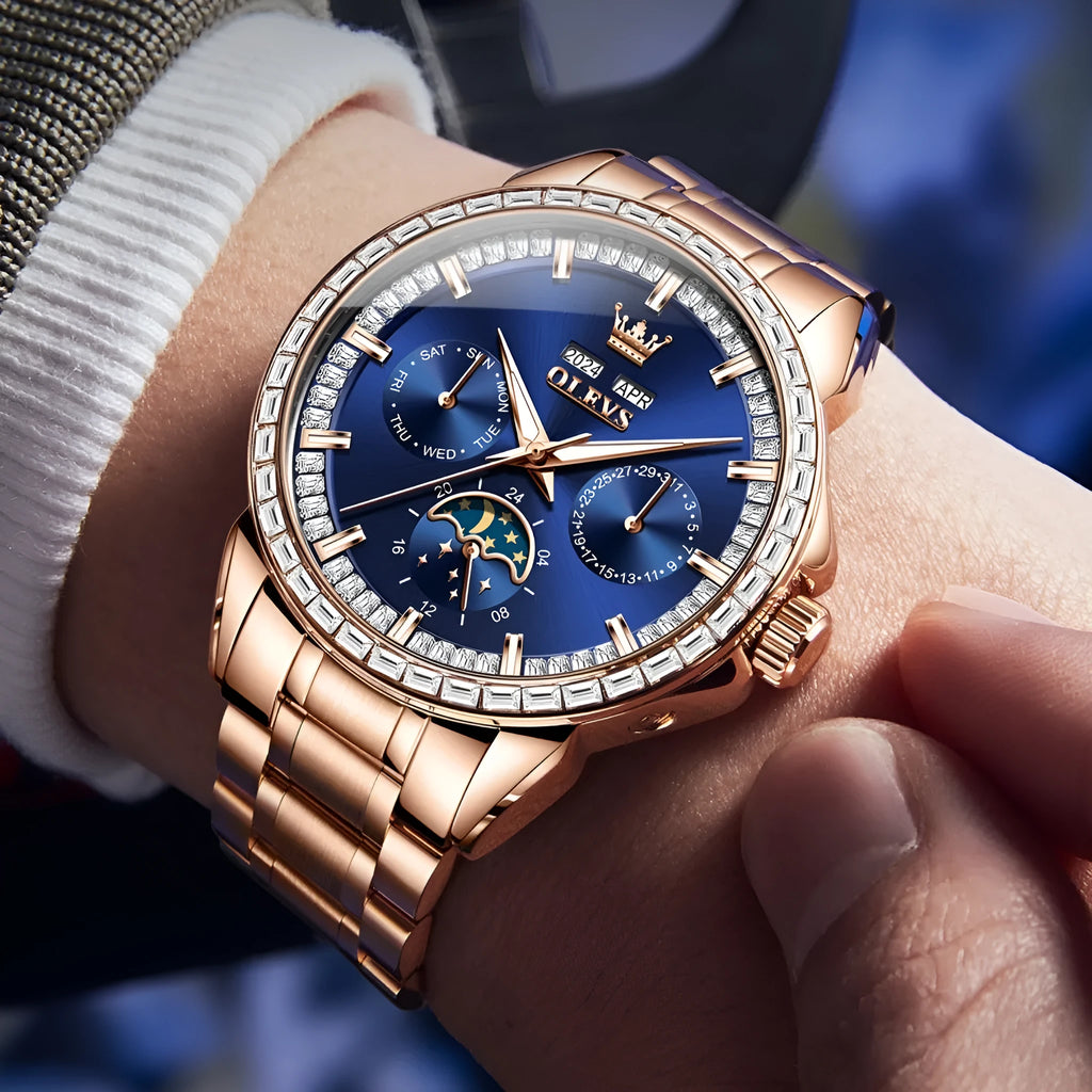 Men's stainless steel automatic watch with diamond dial on wrist, showing butterfly clasp.
