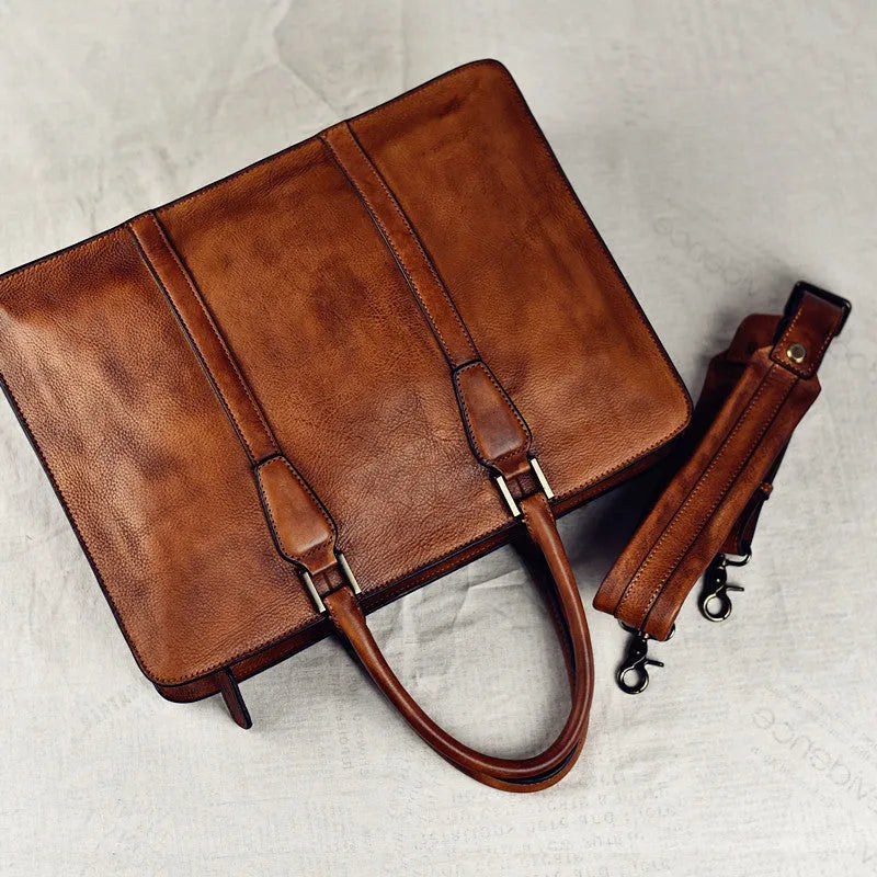 Men's black leather horizontal handbag with zipper opening showing 14-inch size.