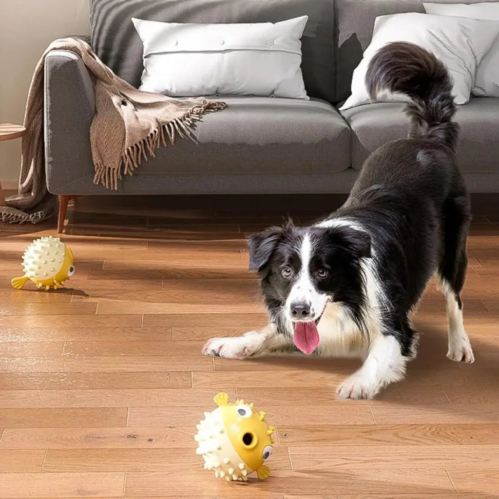 Yellow fish-shaped vinyl dog chew toy with textured surface for aggressive chewers