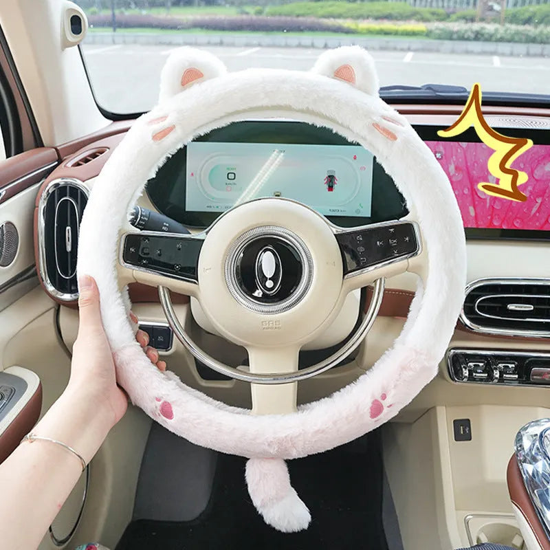 Plush winter steering wheel cover with embroidered cartoon bear design, sized for 38cm diameter wheels.