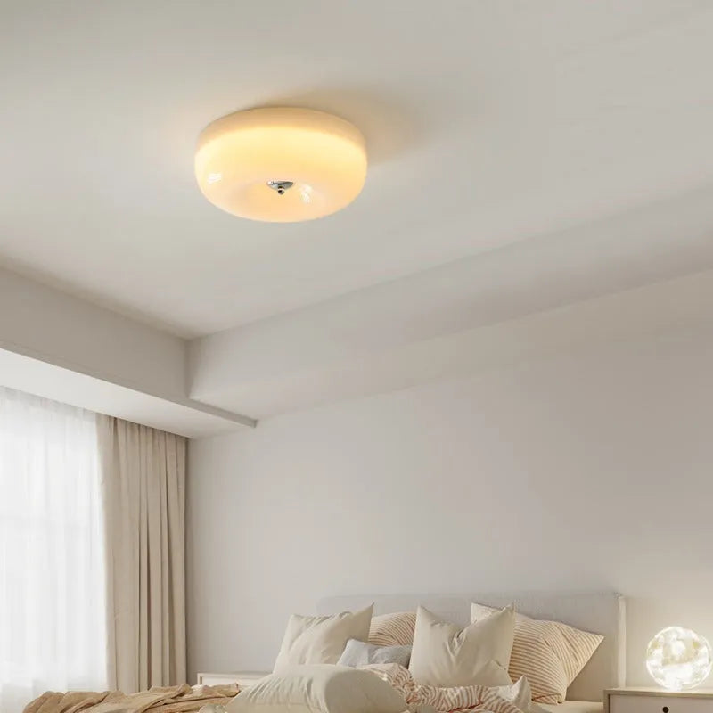 Cream-coloured American vintage style bedroom ceiling light with three-colour settings.